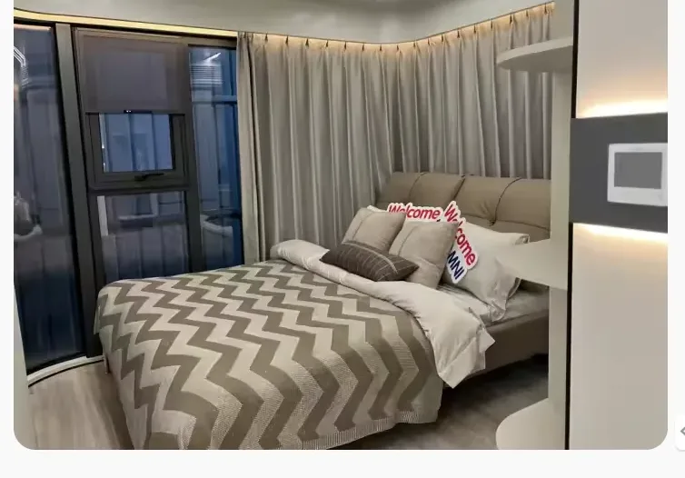 Furnished bedroom inside an 11.5-meter Chinese space capsule prefab home